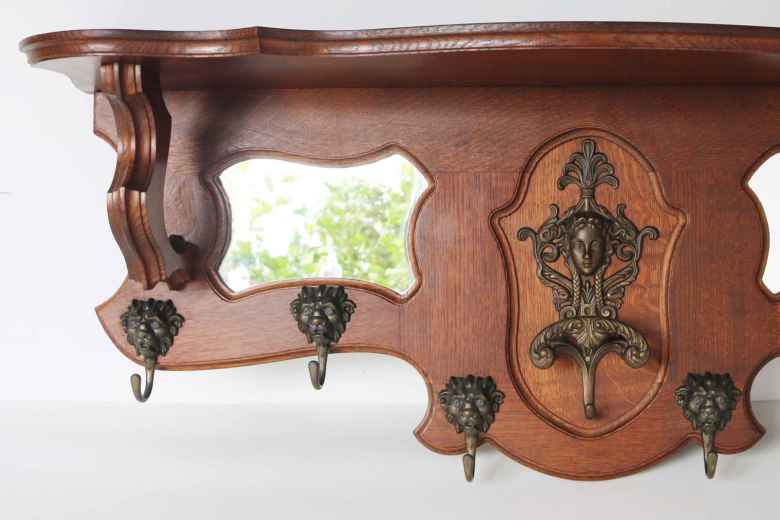 Antique Style Country Rustic Wall Hanging Coat Rack Classical Era Wooden Hall Rack Oak Hat Rack Mirrors Brass Lion Hooks Mid 20th Century photo vintage