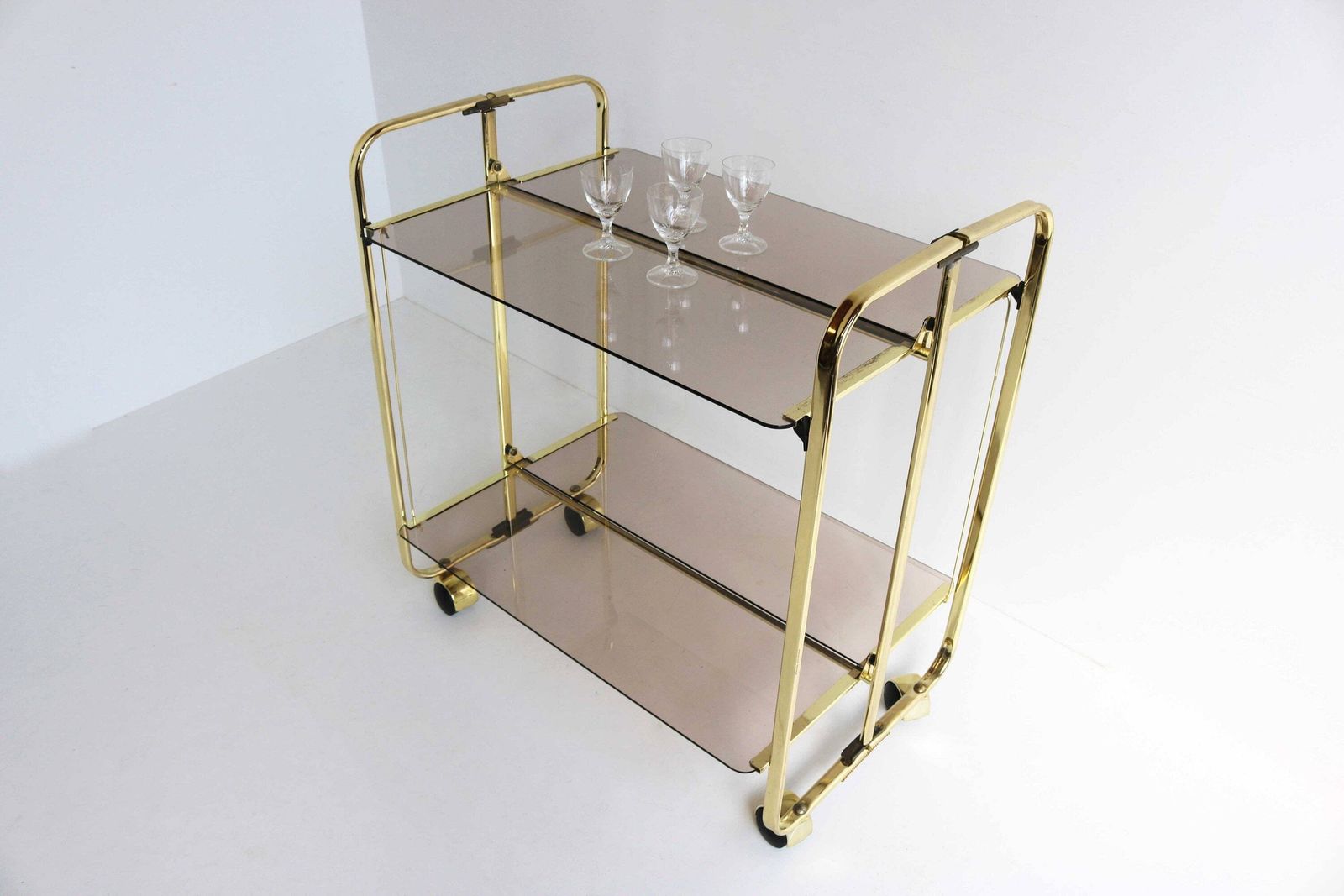 Midcentury Golden Foldable Barcart Teacart Cocktailcart Brass Entertainment Cart Hollywood Serving Cart Display Cart Smoked Glass 1970