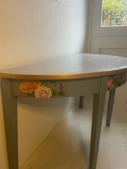 Hand Painted   Unique Half Moon   Accent Table   Elegant Floral Designs And A Rich Gold Trim On A Light Blue Background photo furniture