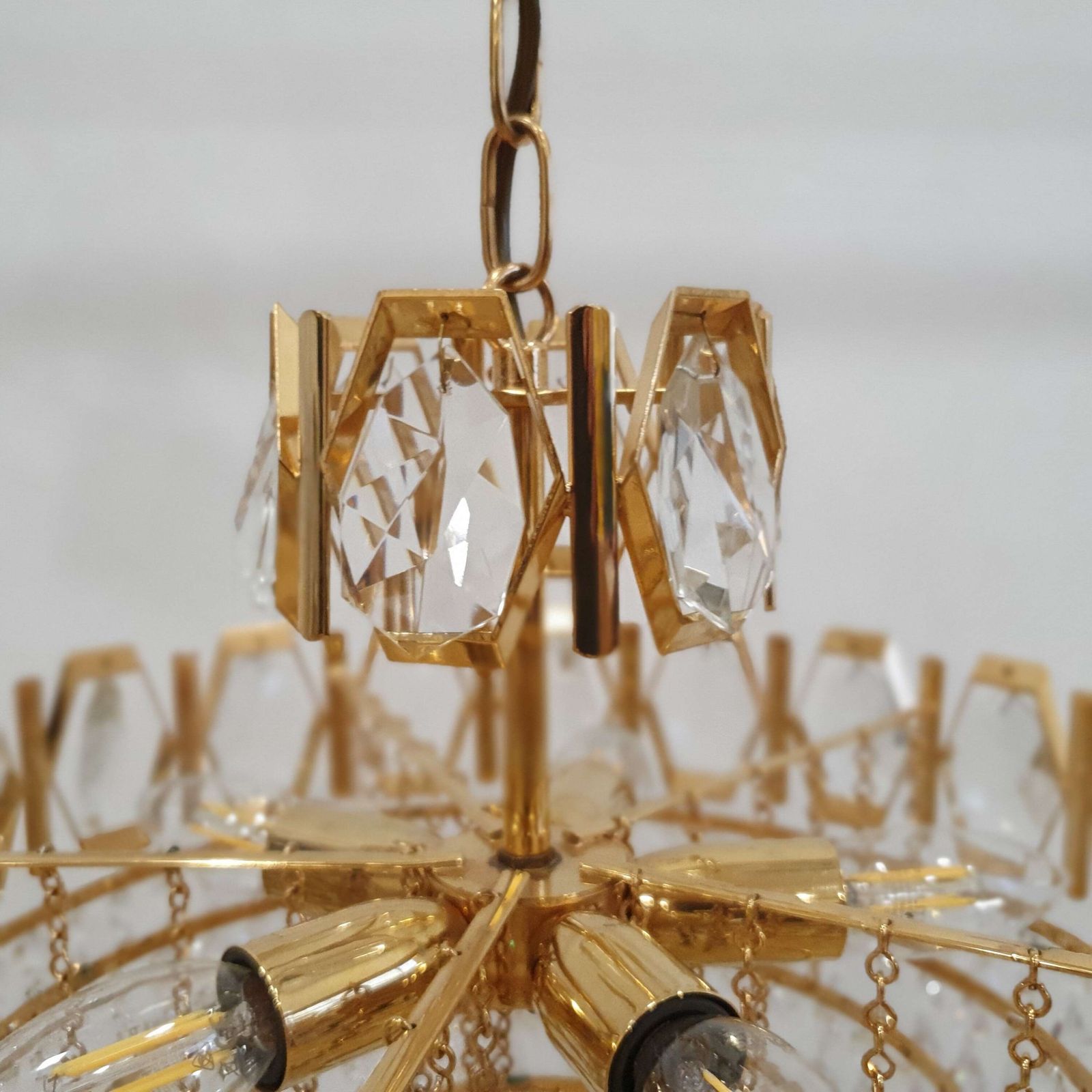 A Swedish Gilded Metal & "Fantastic" Cut Glass Chandelier. 1960s. photo vintage