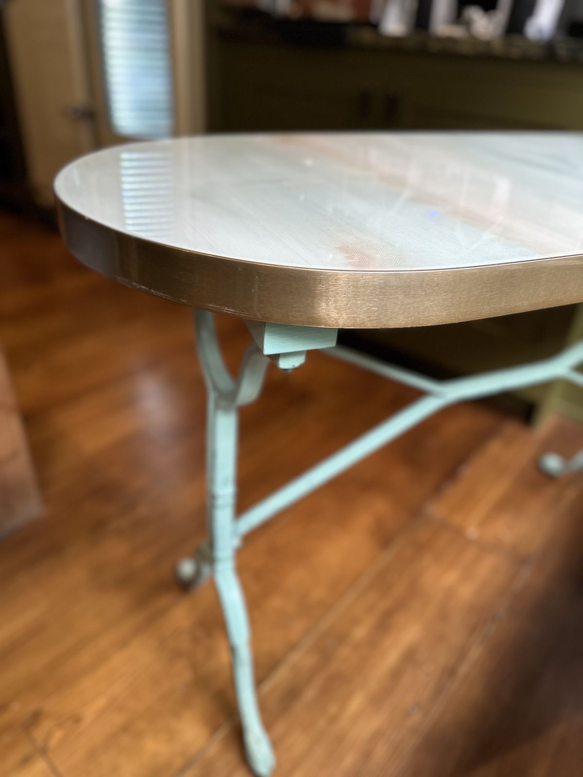 Bespoke French Bistro Table – Brass Rim, Glass Watercolor Top, Cast Iron Legs – Unique Design photo vinterior
