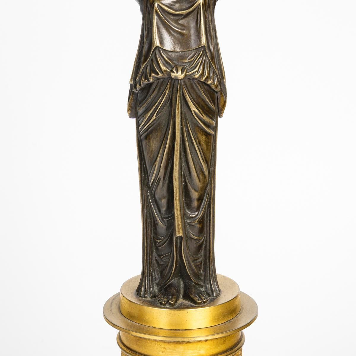 A Pair Of Gilt Bronze And Patinated Candelabra With Winged Victories. photo buy