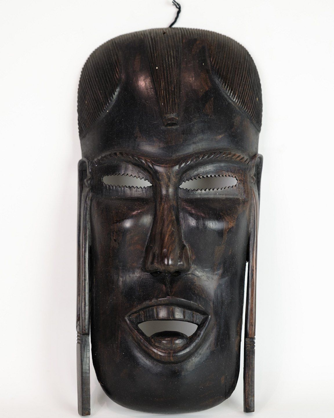 African Mask Hand Carved In Dark Wood photo furniture