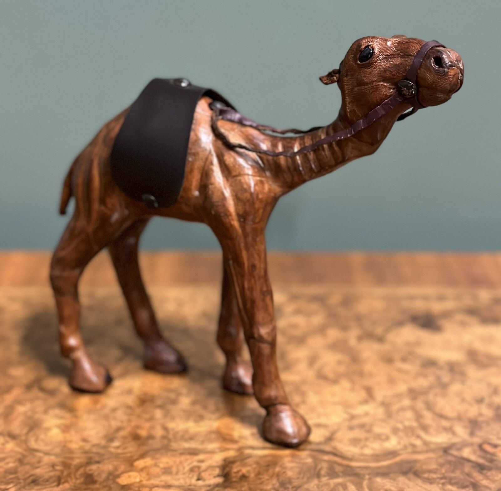 Camel Sculpture With Lovely Aged Leather On Hand Carved Wood By Libertys London photo furniture