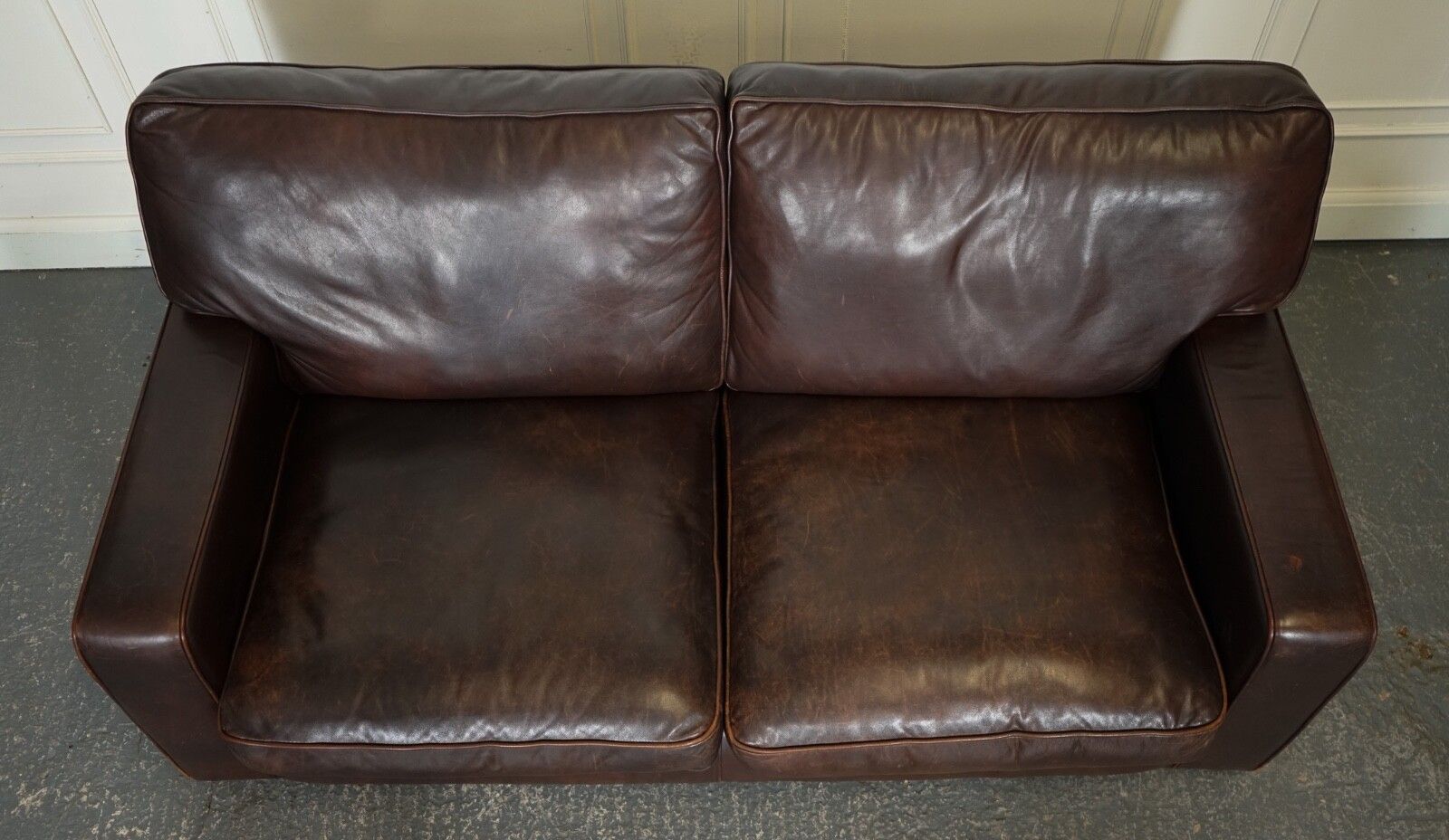 photo furniture Vintage Distressed Brown Leather Two To Three Seater Sofa
