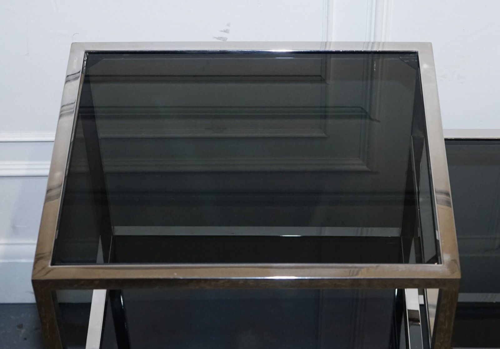 photo furniture Showroom Casa Padrino Smoked Glass Polished Stainless Steel Console Table