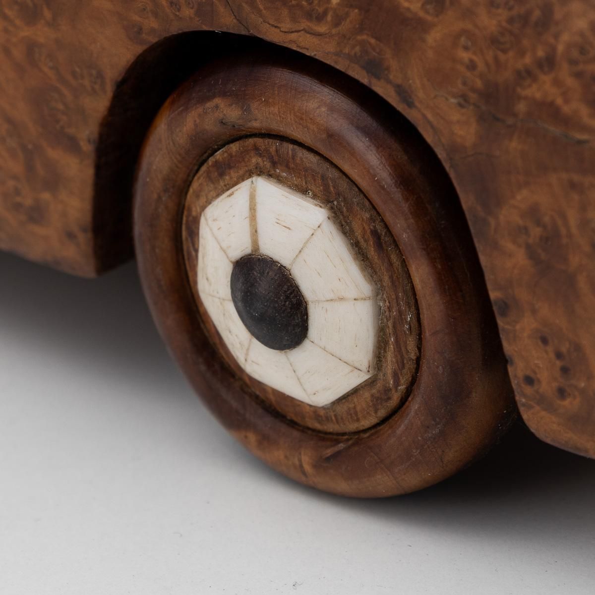 photo furniture 21stc Contemporary Hand Carved Wooden Cadillac Car C.2000