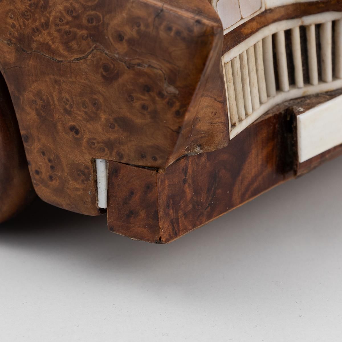 photo for sale 21stc Contemporary Hand Carved Wooden Cadillac Car C.2000