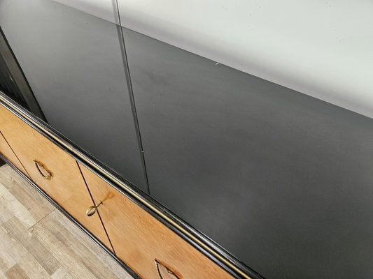 Art Deco Sideboard In Mahogany And Maple With Black Glass And Brass Finishes By Osvaldo Borsani For La Permanente Mobili Cantù, 1950 photo vintage