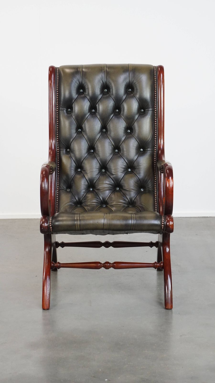 Elegant Green Cowhide English Chesterfield Armchair With An Elegant Wood Finish photo furniture