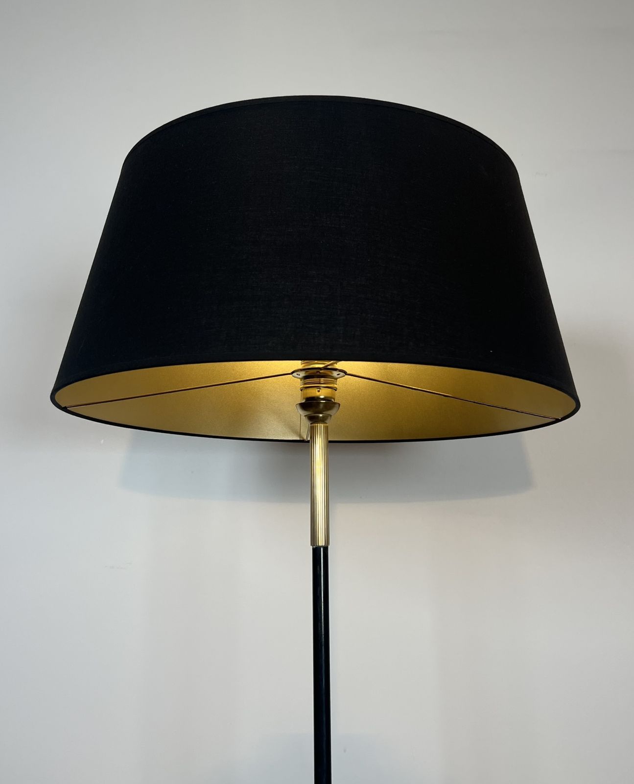 Designer Floor Lamp In Black Lacquered Metal And Brass With Incorporating A Magazine Rack photo Lighting