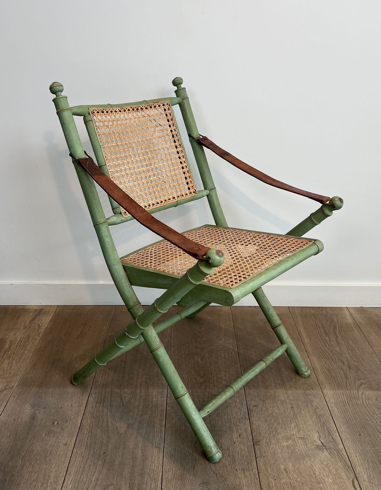 Pair Of Folding Safari Chairs In Weathered Faux Bamboo Style With Caned Backs And Seats And Leather Armrests photo buy