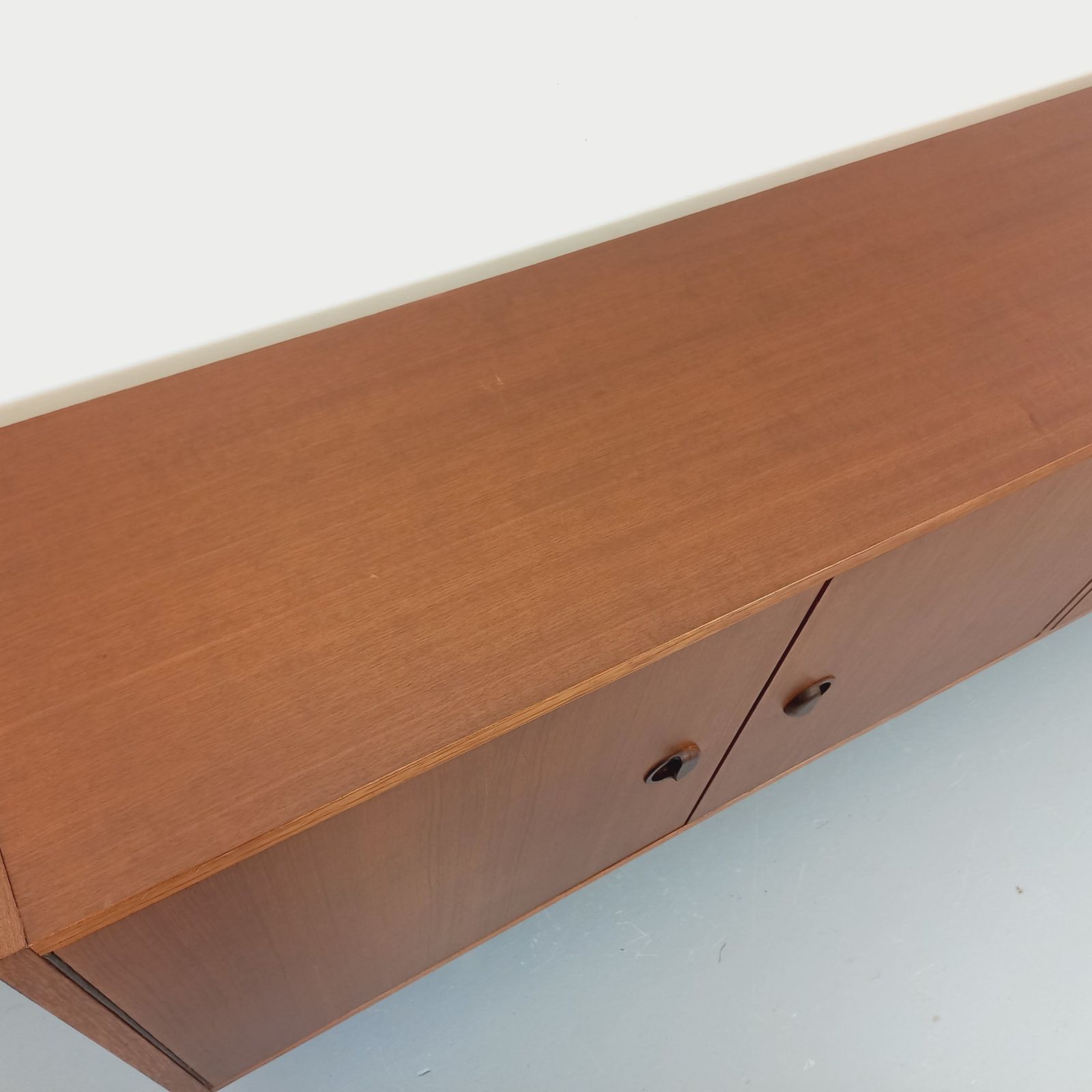photo vintage Modernist Sideboard In Teak With Black Metal Legs
