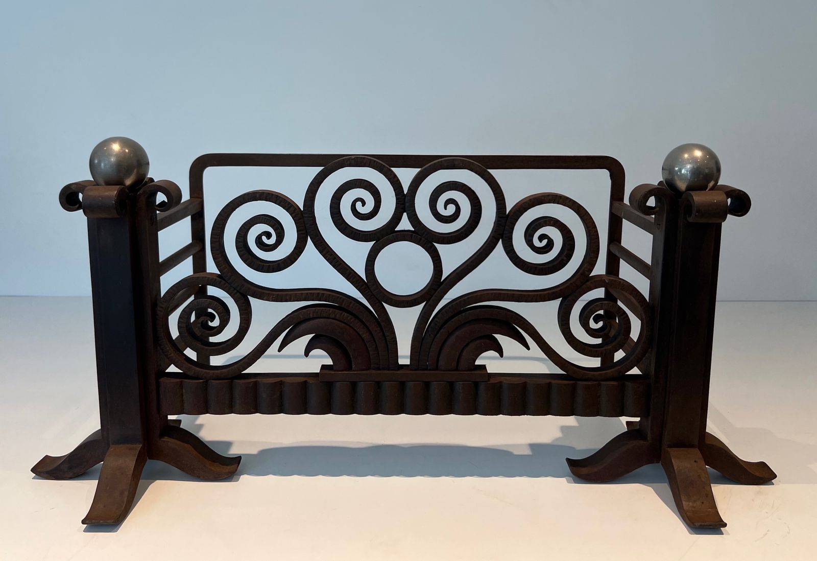 Log Basket Or Andirons In Hammered Wrought Iron And Chrome In The Style Of Edgar Brandt. Circa 1930