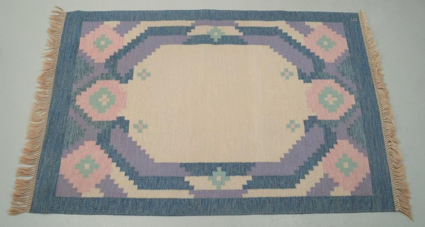 Swedish Carpet In Pure Wool. Geometric Pattern In Blue, White, And Pink Colors. photo for sale