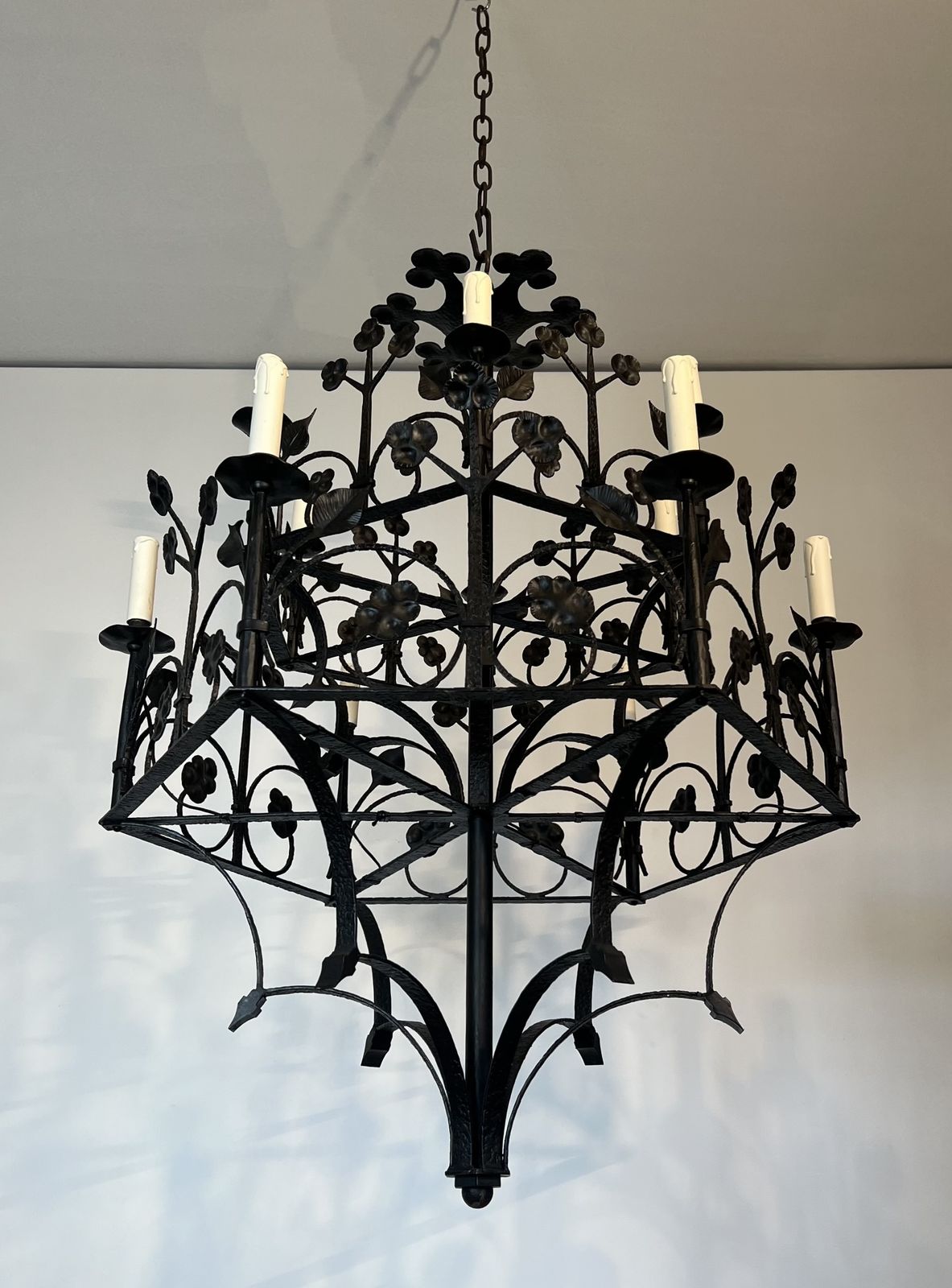 8500.0 Large 12 Light Wrought Iron Chandelier With Clover And Foliage Decorations photo