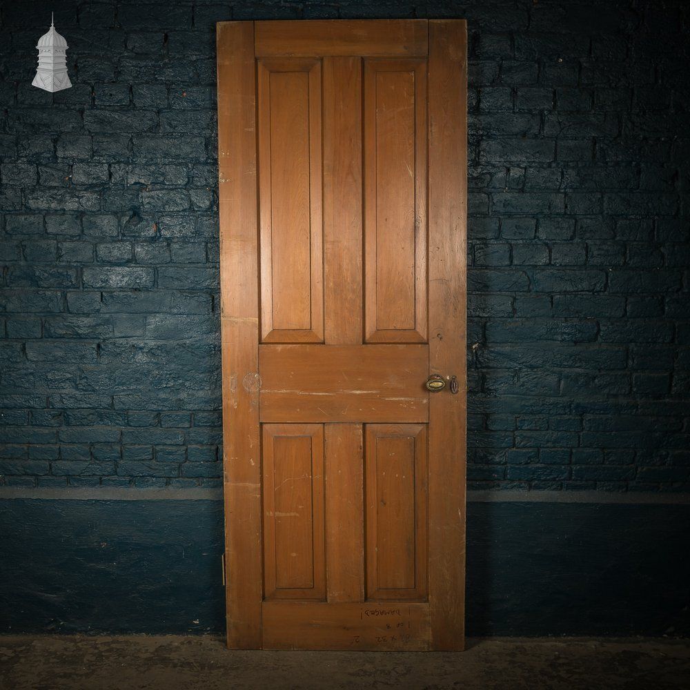 Four Panel Door, Moulded With A Worn Stained Finish. photo furniture
