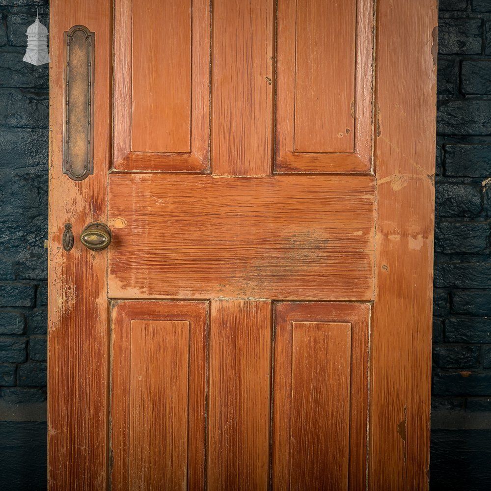 Four Panel Door, Moulded With A Worn Stained Finish. photo Home Fixtures