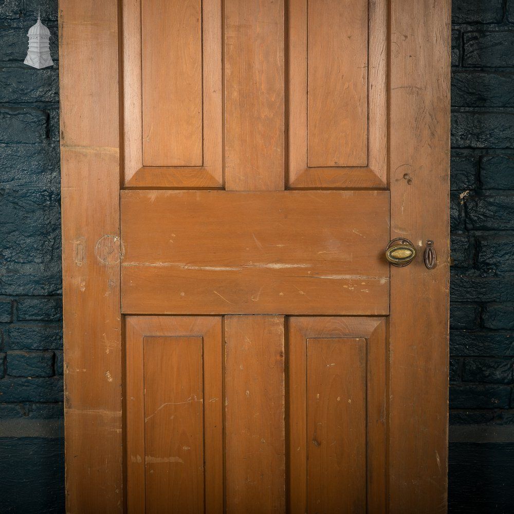 Home Fixtures Four Panel Door, Moulded With A Worn Stained Finish. photo
