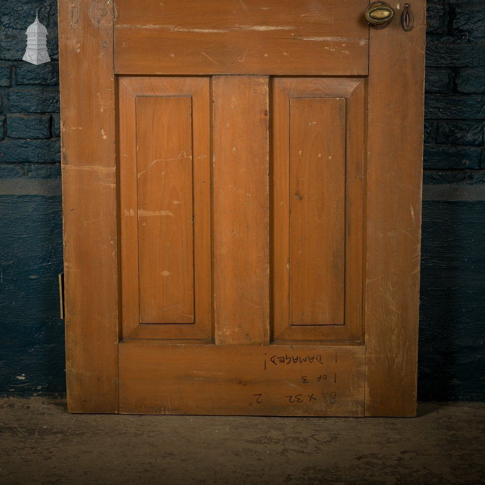 300.0 Four Panel Door, Moulded With A Worn Stained Finish. photo