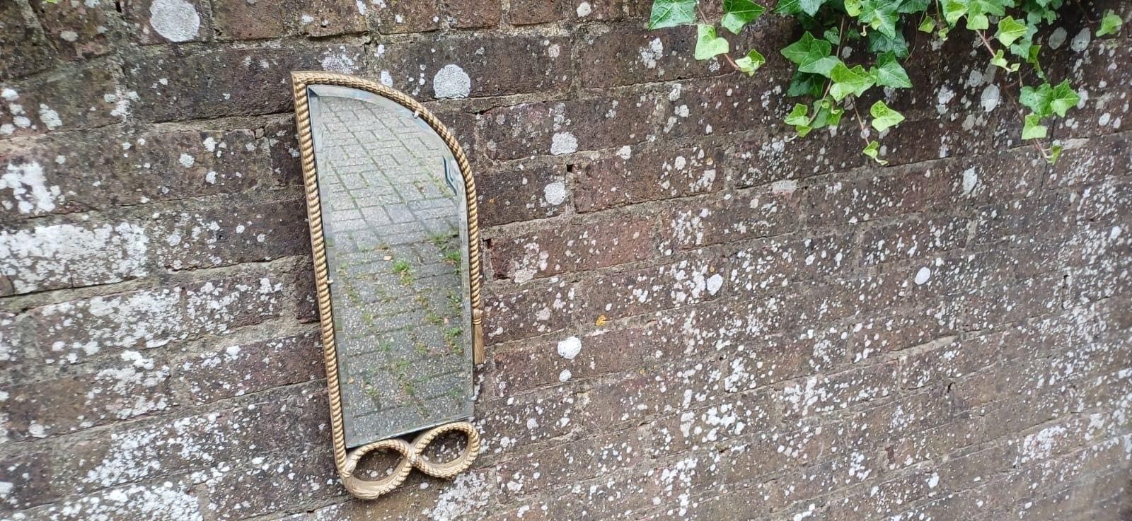 photo furniture Quirky Vintage Wall Mirror With Intricate Braided Edging, Angle Wing Style, Retro Vintage Wall Mirror