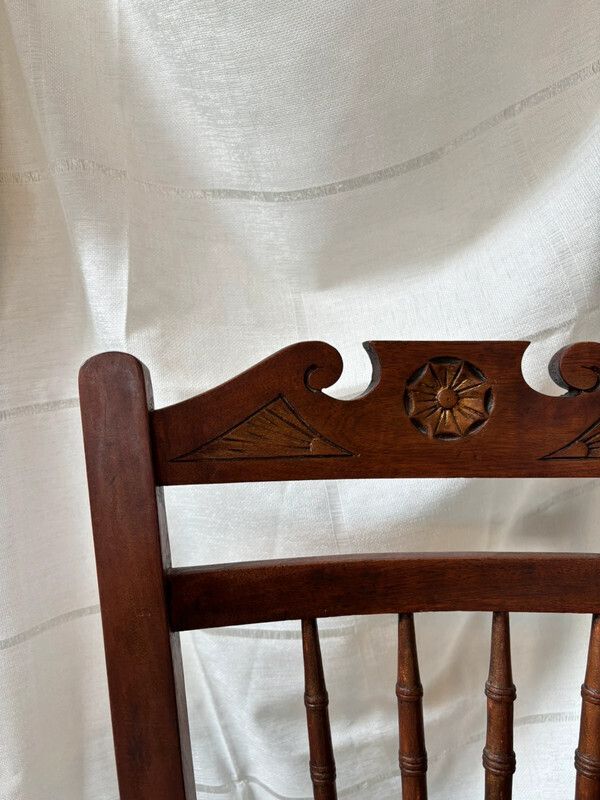 Vintage Wooden Spindle Chair With Carved Back And Woven Seat Frame