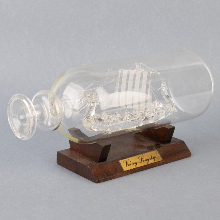 Hand Blown Glass Viking Longship In Glass Bottle Display photo furniture