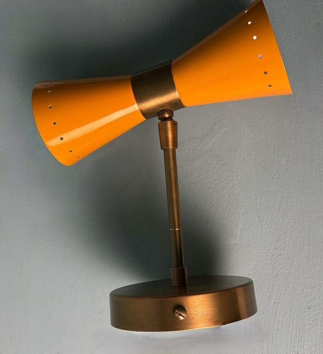 photo furniture Stilnovo Style  Pair Of Italian Wall Sconces In Lacquered Metal And Brass
