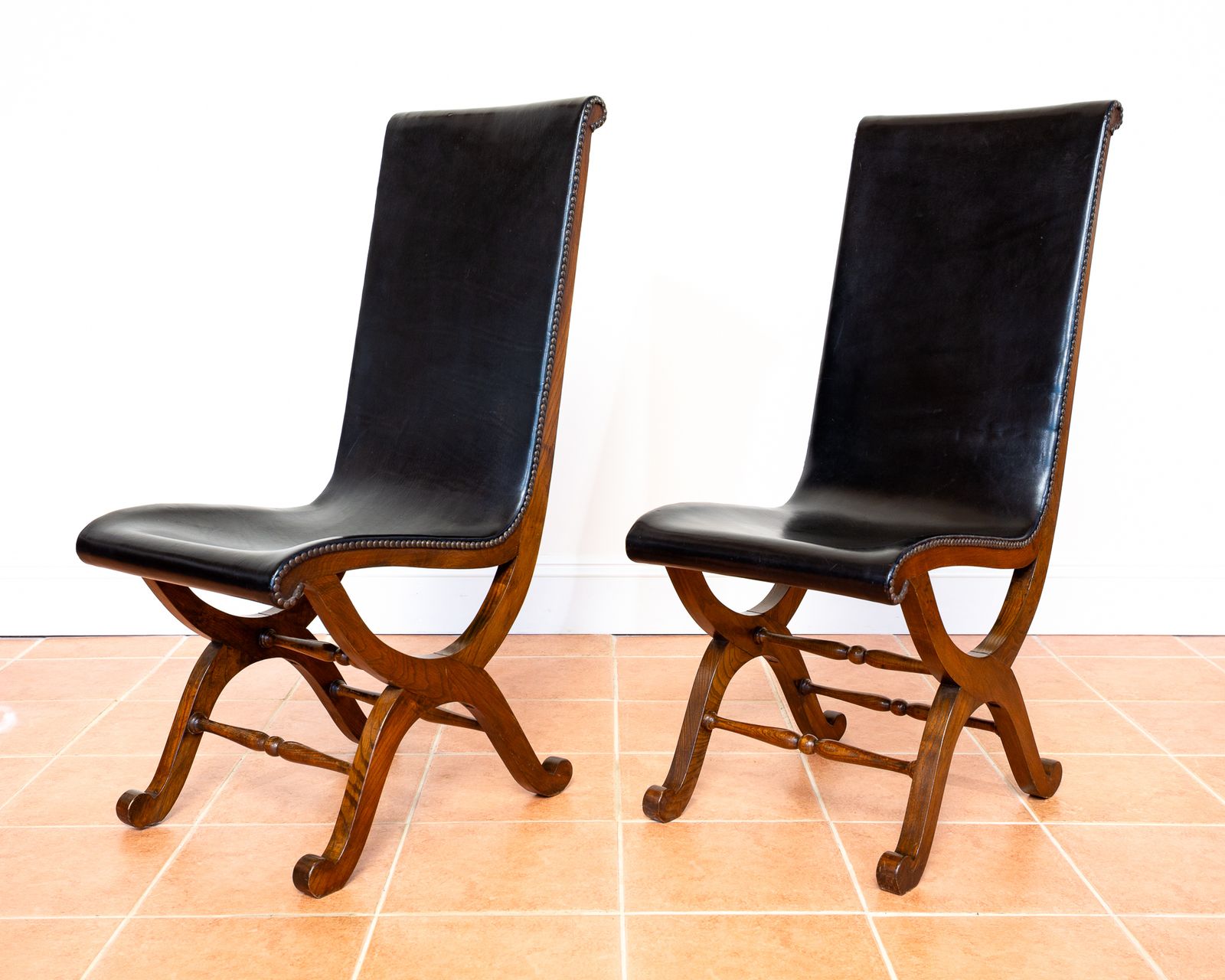 4 Spanish Oak Leather Dining Chairs By Pierre Lottier Valmazan Mid Century Neoclassical Colonial 1960s Black Leather Sling Seat Studded Leather photo vintage