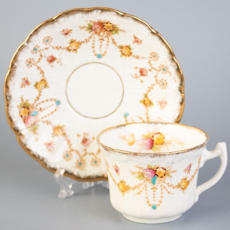 Antique Art Nouveau Bow Porcelain Ceramic Teacup & Saucer
