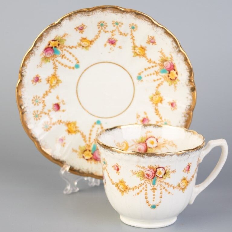 Antique Art Nouveau Bow Porcelain Ceramic Teacup & Saucer
