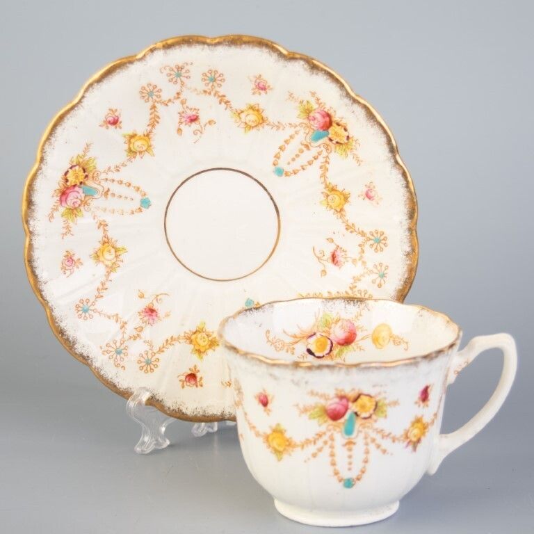 Antique Art Nouveau Bow Porcelain Ceramic Teacup & Saucer