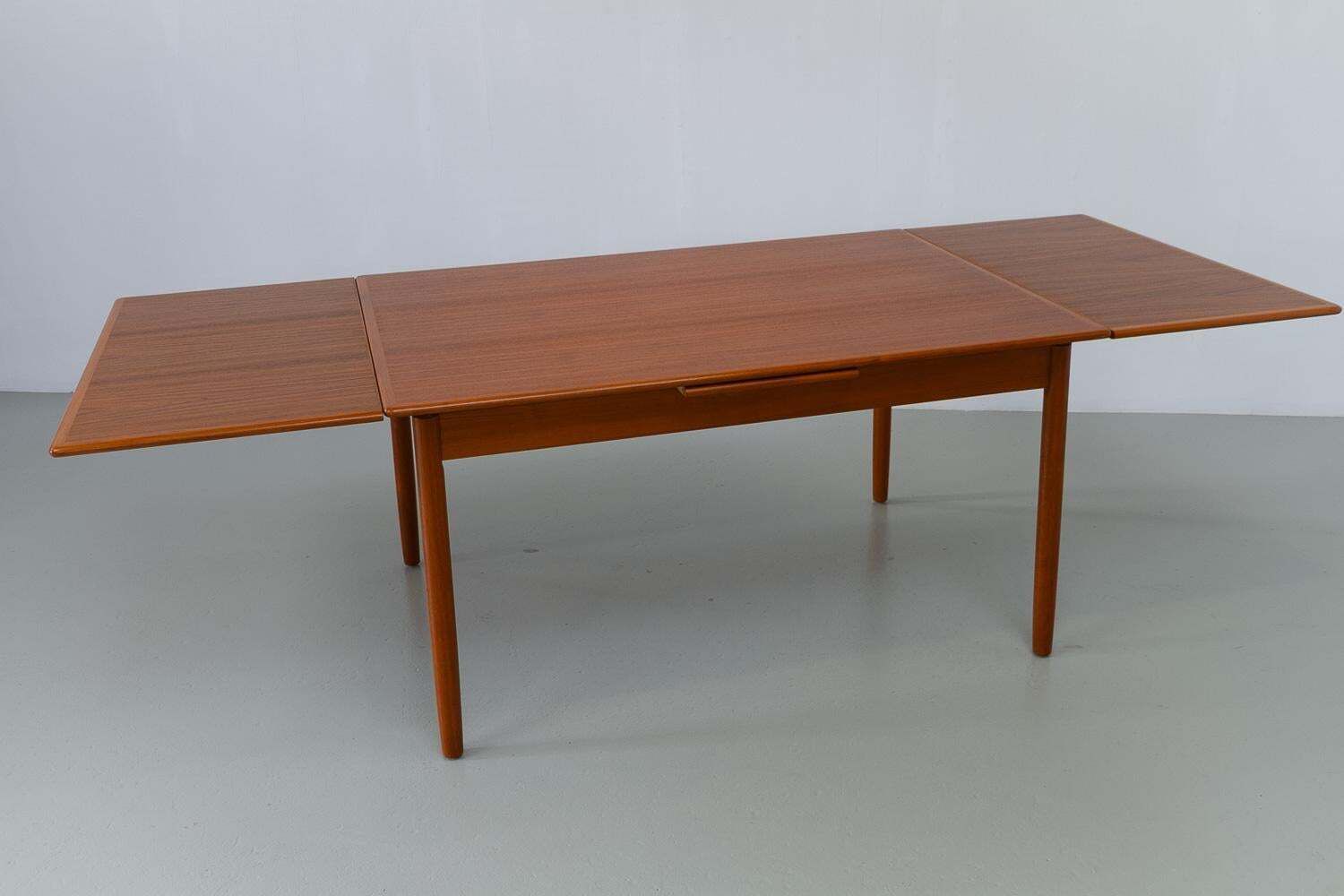 photo furniture Danish Mid Century Extendable Teak Dining Table, 1960s.