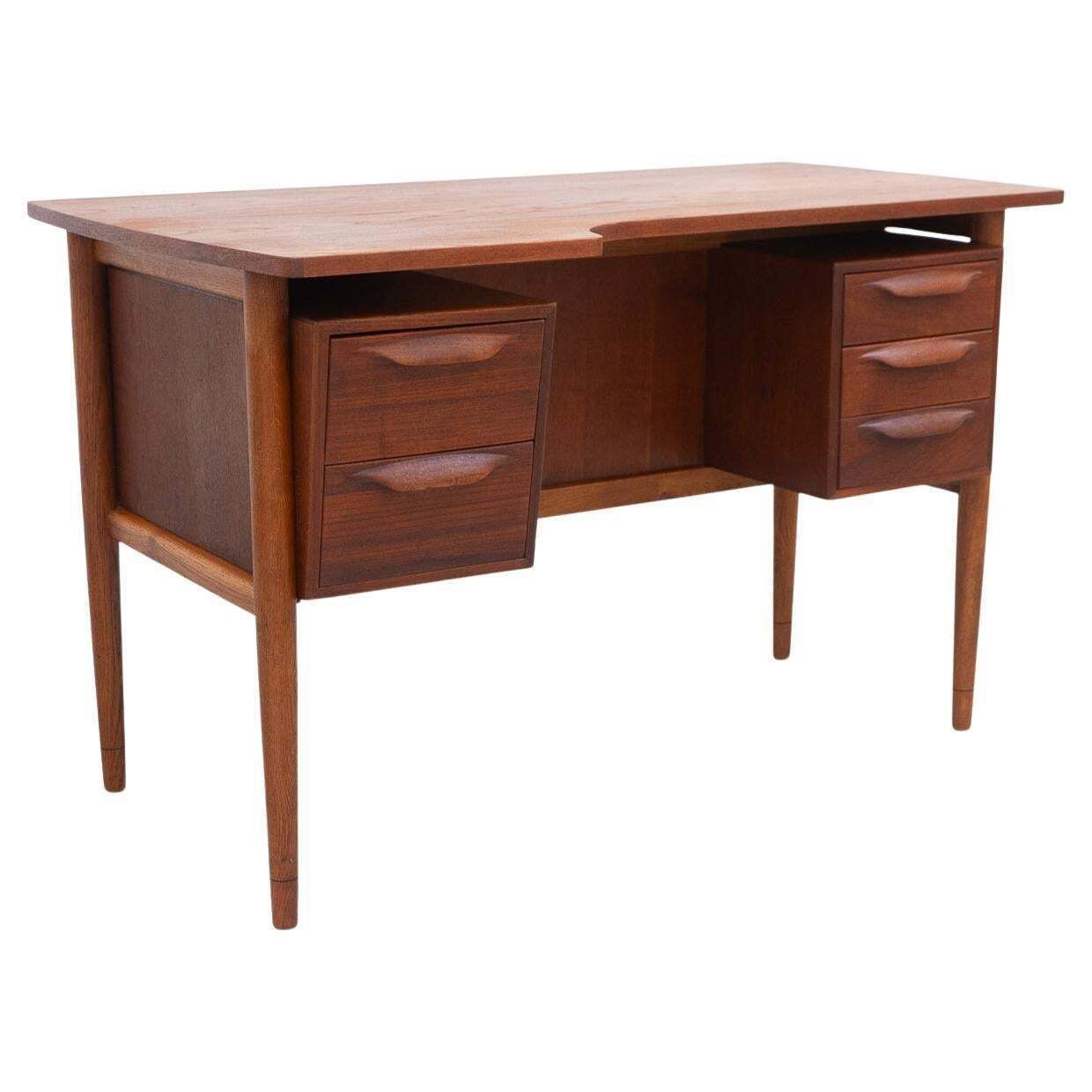 Danish Mid Century Modern Asymmetrical Teak Desk, 1950s.