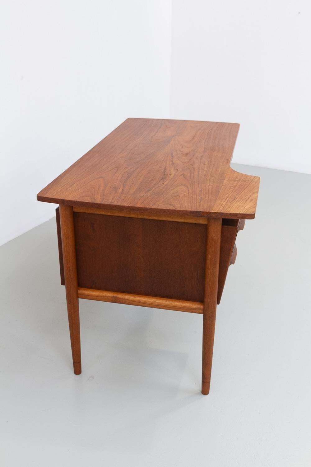 Danish Mid Century Modern Asymmetrical Teak Desk, 1950s. photo vinterior