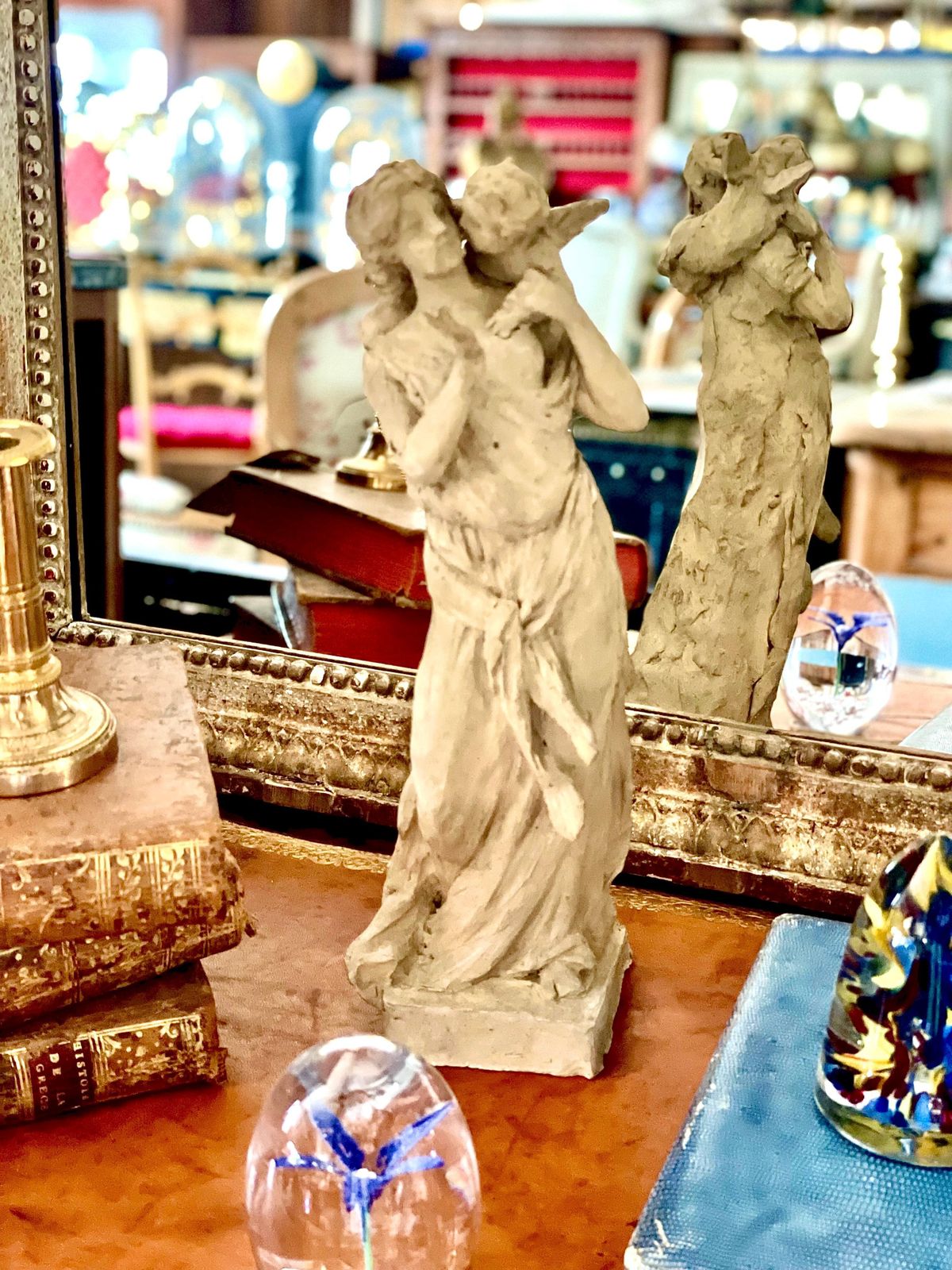 photo buy Terracotta Statuette Of A Goddess And Winged Cherub