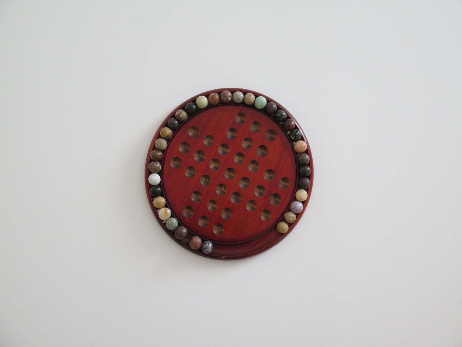 photo vinterior Marble Solitaire Game With Hardwood Board And 33 Agate Stone Marbles, Circa 1925
