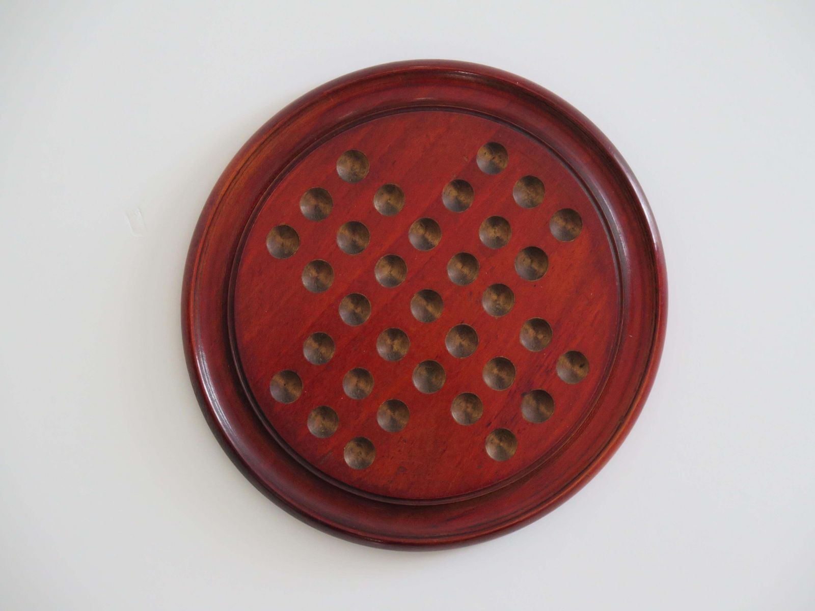 photo vintage Marble Solitaire Game With Hardwood Board And 33 Agate Stone Marbles, Circa 1925