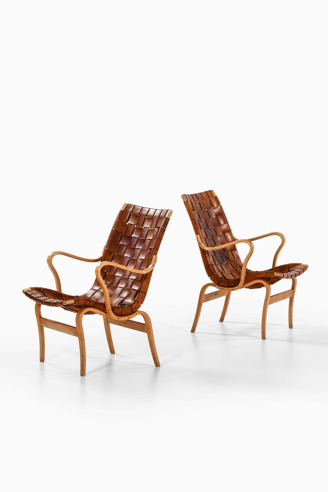 Pair Of Easy Chairs In Birch & Original Leather Webbing By Bruno Mathsson, 1968 photo furniture