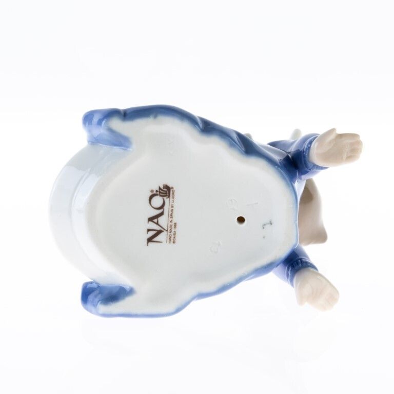 Nao By Lladro Fine Porcelain Sculpture Of A Baby Eating photo furniture