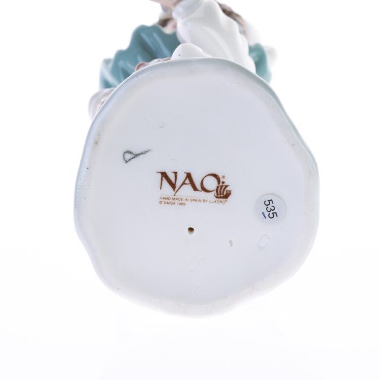 Nao By Lladro Fine Porcelain Sculpture Of A Boy Pierrot Clown With Doll photo furniture