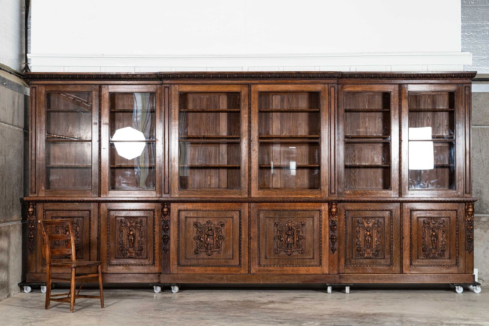 Magnificent Monumental English 19thc Carved Oak Breakfront Glazed Bookcase photo for sale