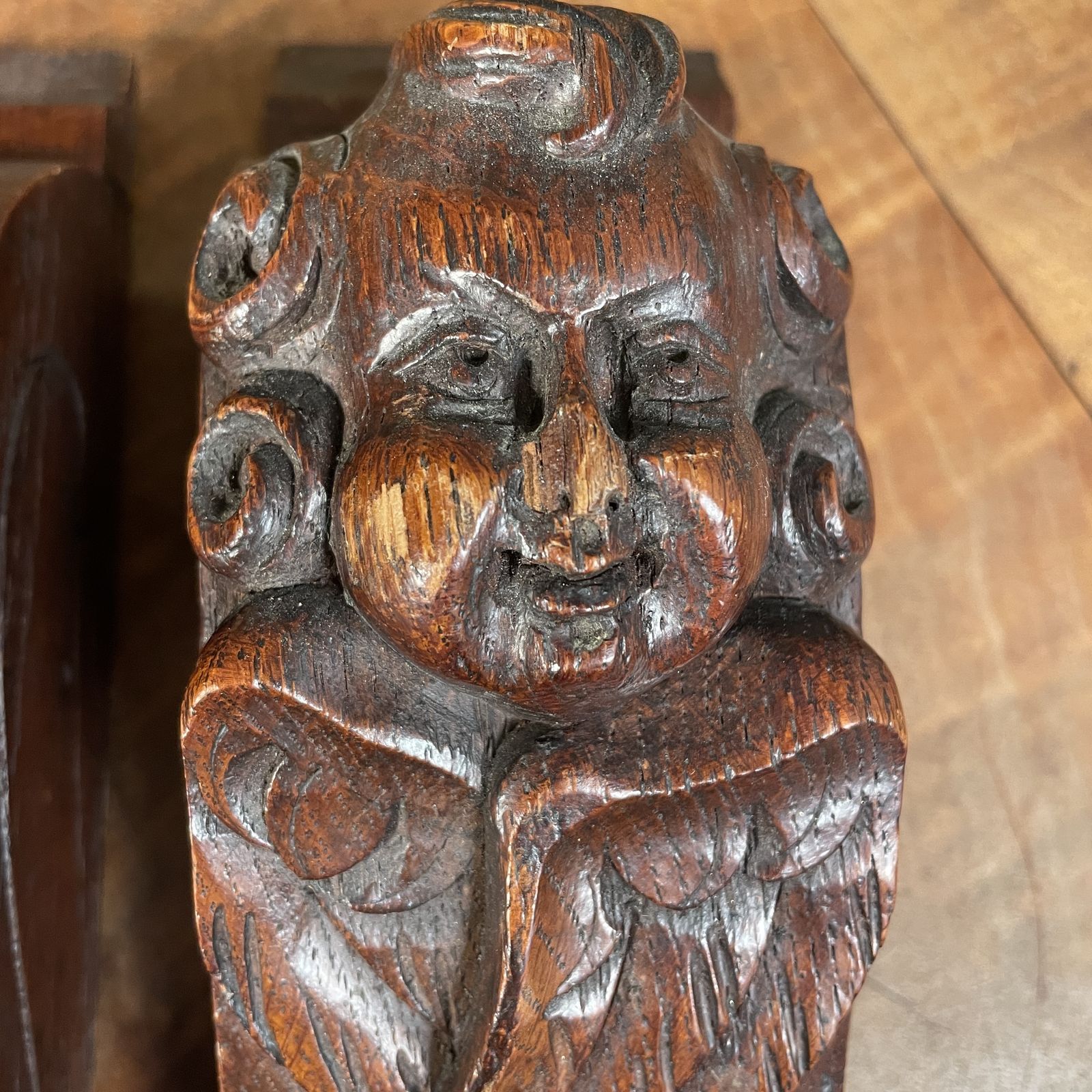 A Pair Of Carved Wooden Cherub Heads photo furniture