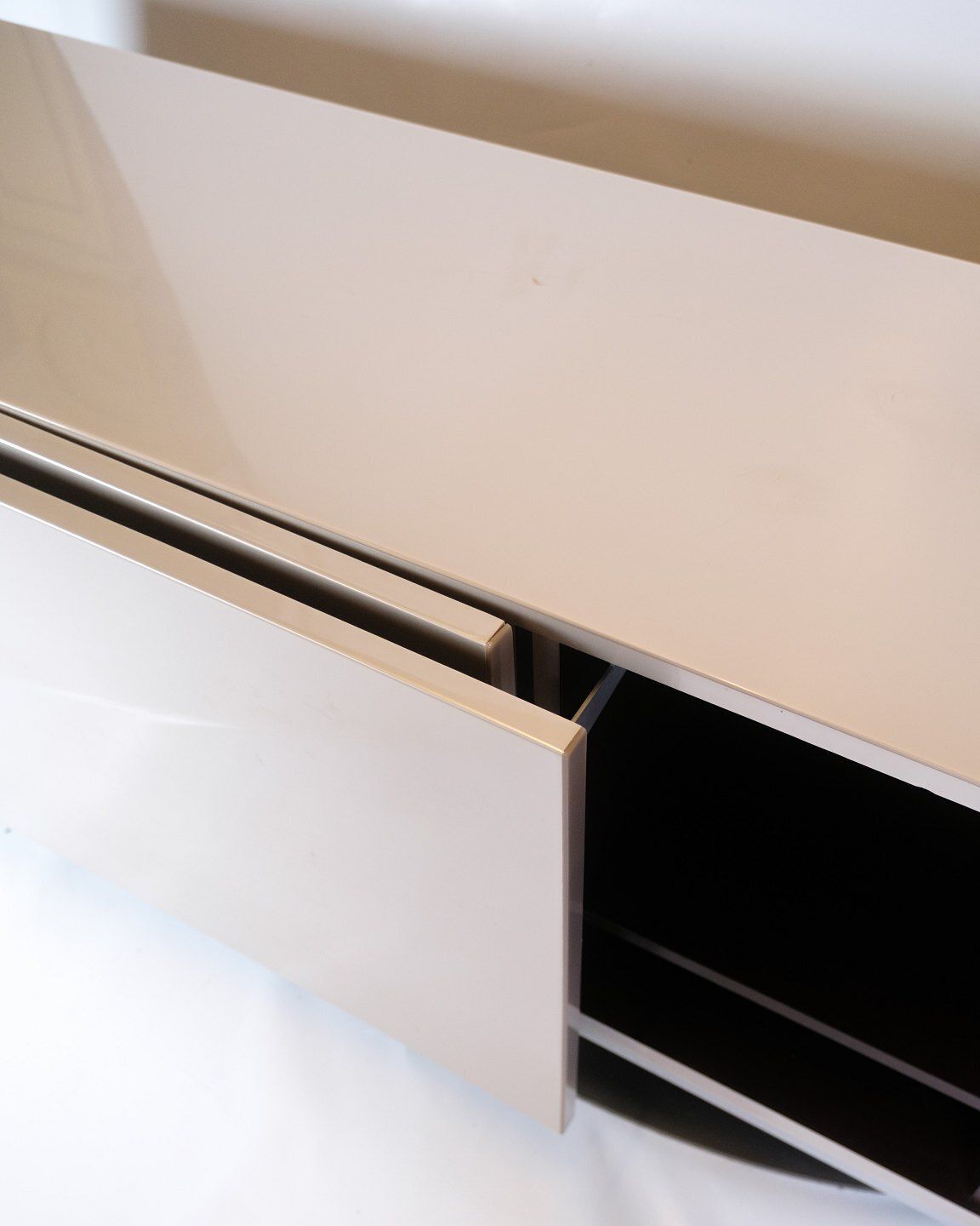 photo furniture Speed ​​Up Sideboard Model Speed ​​Up In High Gloss Grey Painted & Steel Base By Sacha Lakic  For Roche Bobois Paris