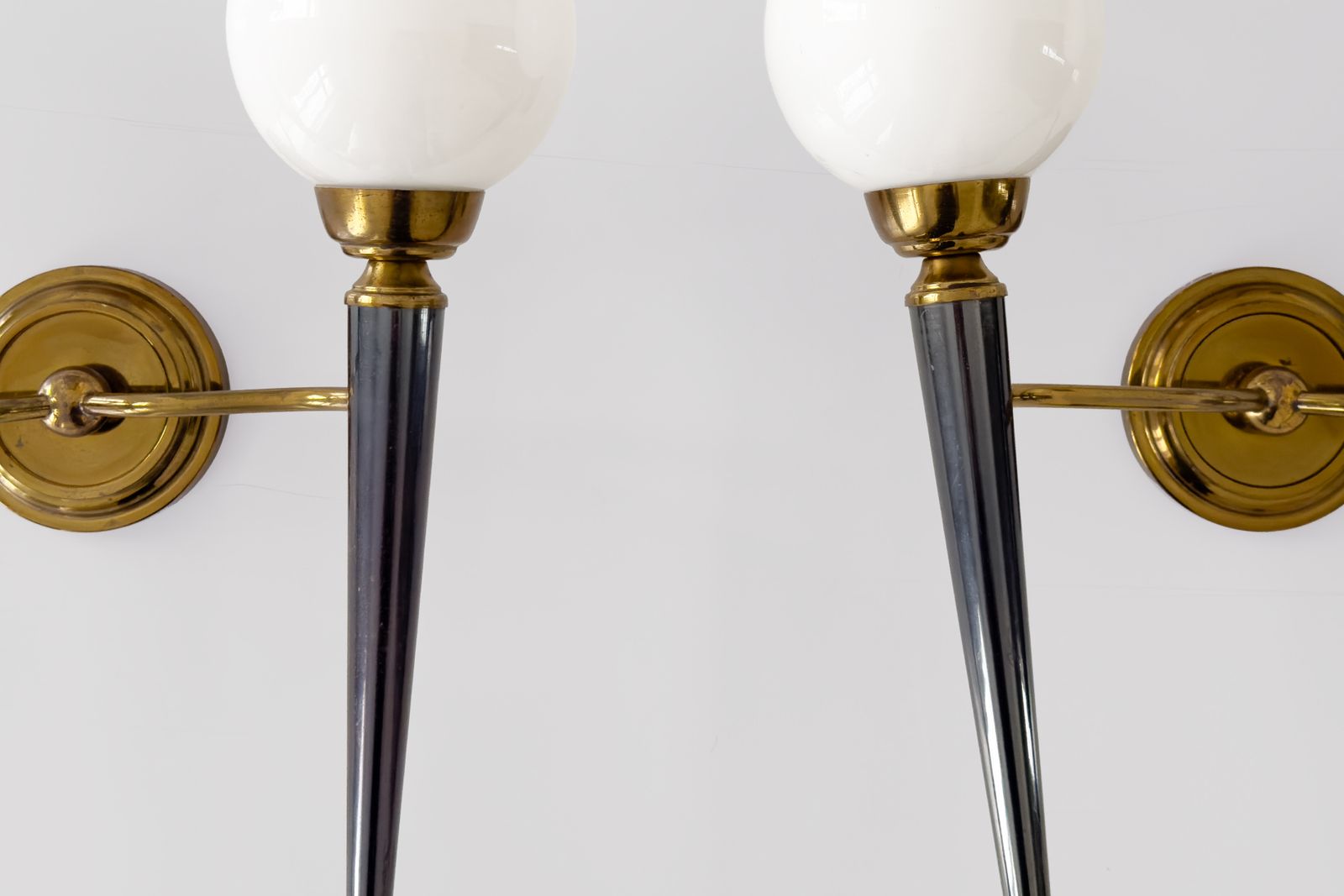 Attributed To The House Of Jansen, Pair Of Two Light Sconces In Gilded & Blue Toned Metal With Opaline Shades. photo furniture