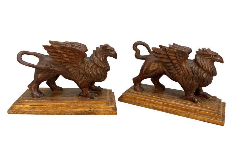 A Pair Of Carved Griffins On Plinths photo Art