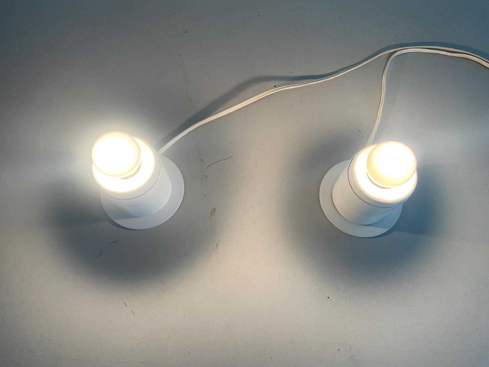 photo for sale Minimal Design Pair Of White Metal Wall Lamps Still Of Artemide, 1970s, Italy