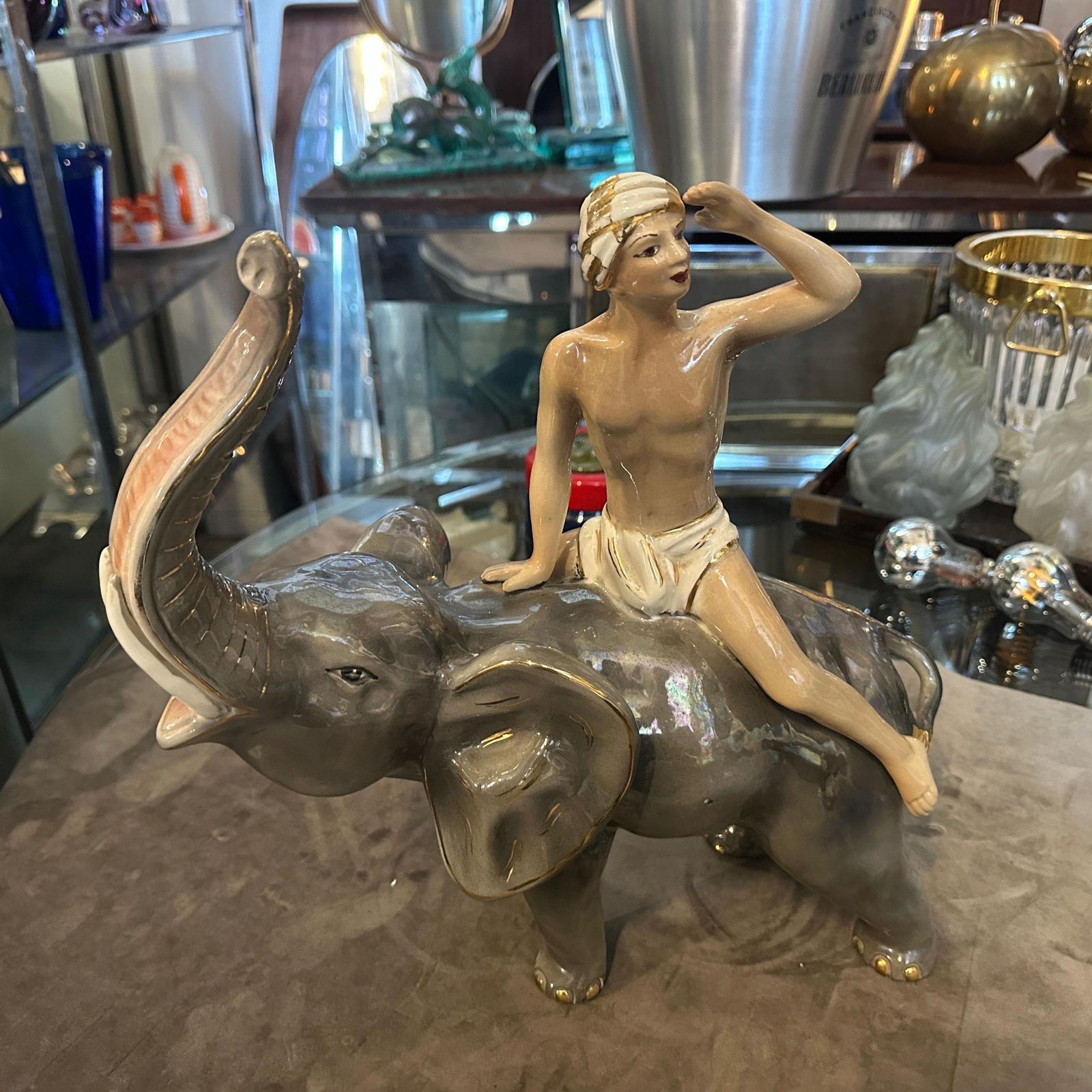 photo furniture 1950s Orientalist Ceramic Italian Figure Of A Boy On An Elephant By Sica