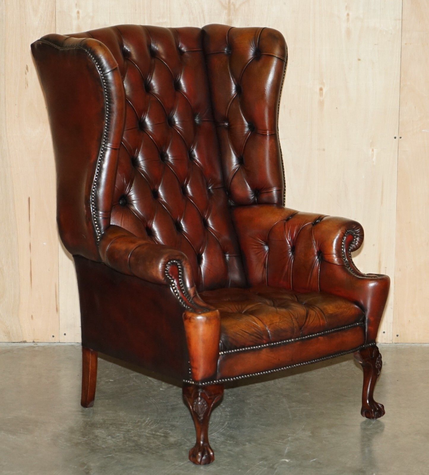 photo vintage Pair Of Fully Restored Chesterfield Claw & Ball Feet Wingback Armchairs & Stools