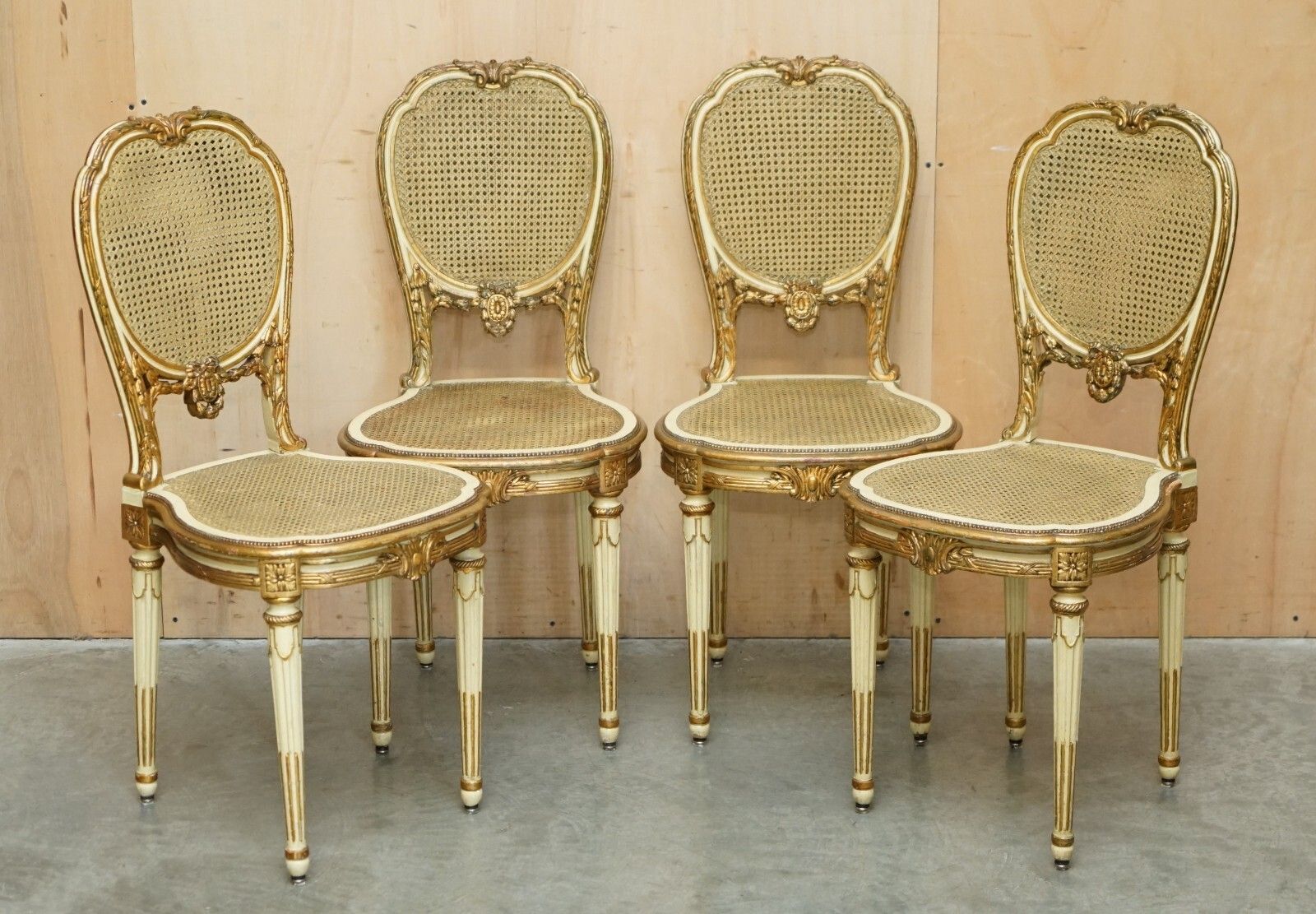 Four Stunning Louis XVI French Carved Giltwood Double Caned Bergere Side Chairs